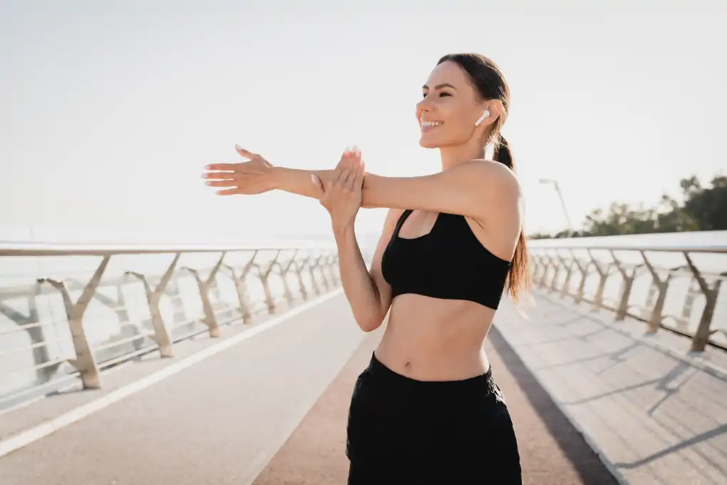 Athletic girl stretching